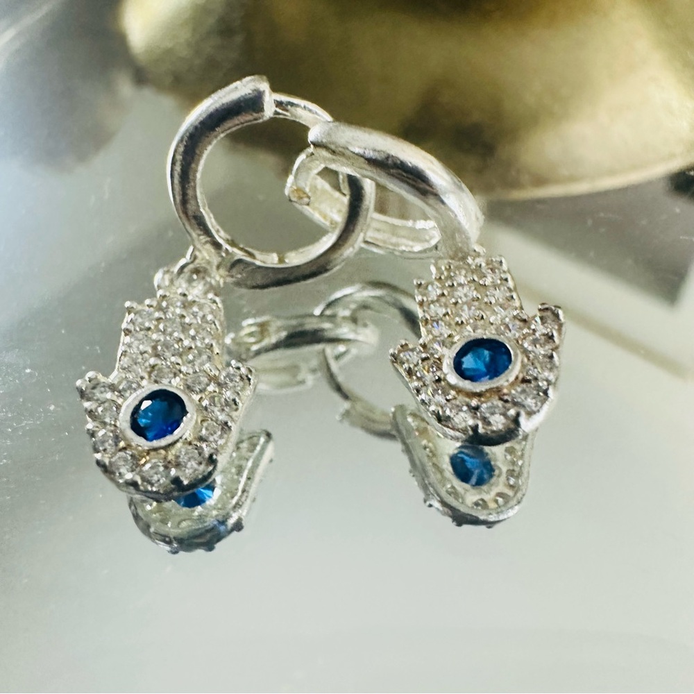 Elegant Silver Hamsa Earrings with Blue Zircon Accents - Picture 1 of 10